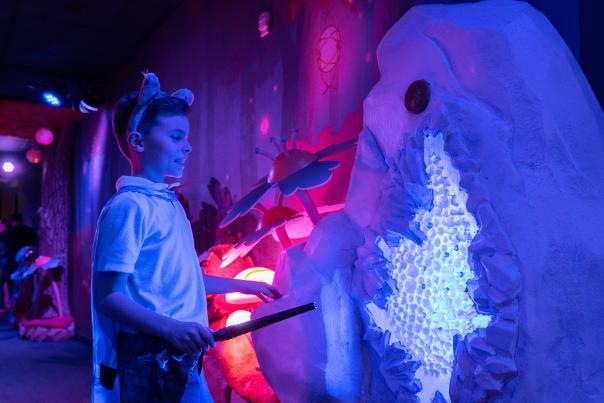 A boy embarks on the "Magic Quest" experience at Great Wolf Lodge