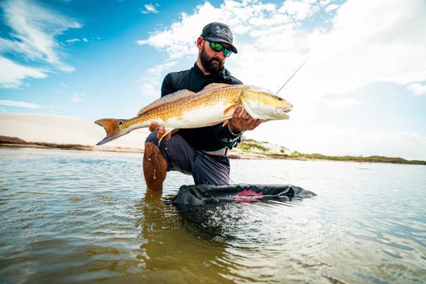 Jesse Torres Holding A Large Fish In Corpus Christi, TX