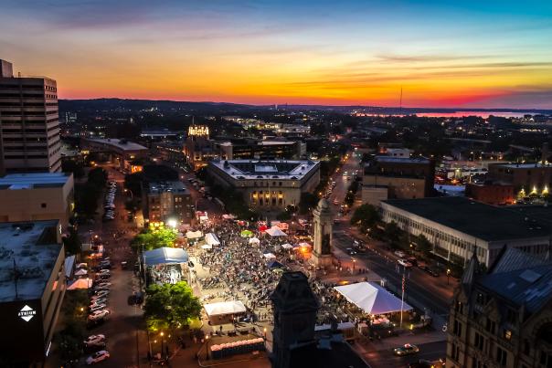 Drone image of sunset over NYS Blues Festival in Clinton Square Syracuse
