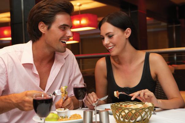 A couple enjoying a meal at a restaurant