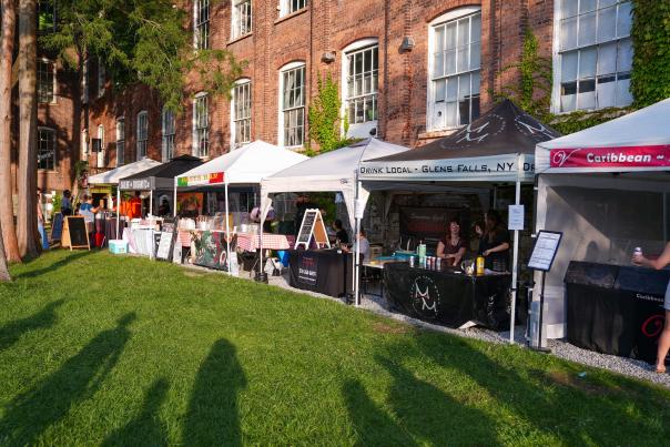 Vendors set up outside of The Shirt Factory during Thursday Market & Food Truck Corral