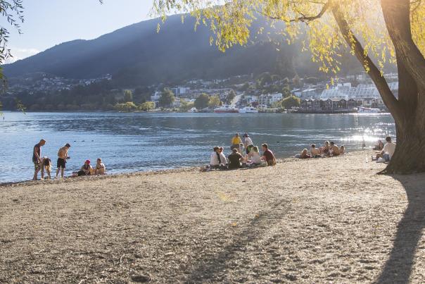 People sitting on Queenstown Bay