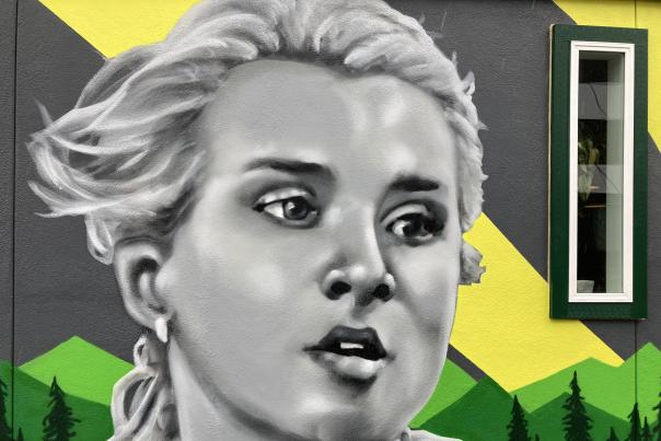 Olympian Brianne Theisen-Eaton mural on the west side of Track Town Pizza
