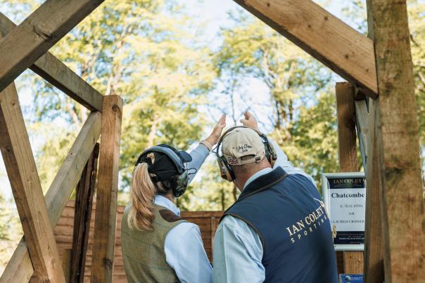 Coach and player at Ian Coley shooting ground