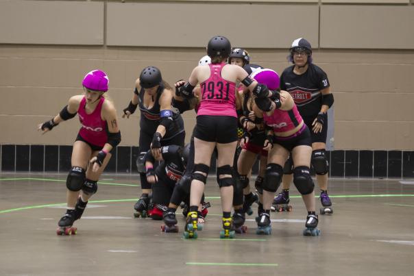 Group playing roller derby