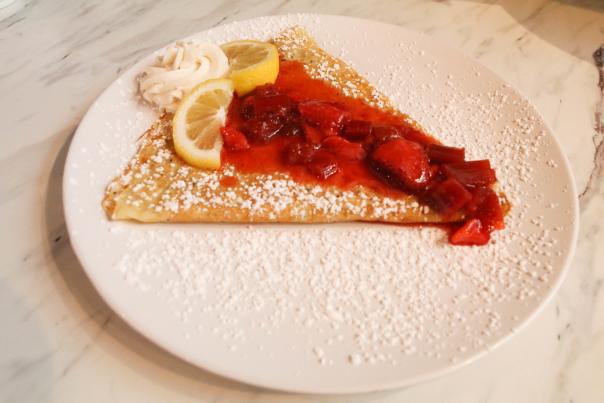 Crepe with strawberries and powdered sugar at Brown Butter Creperie & Cafe