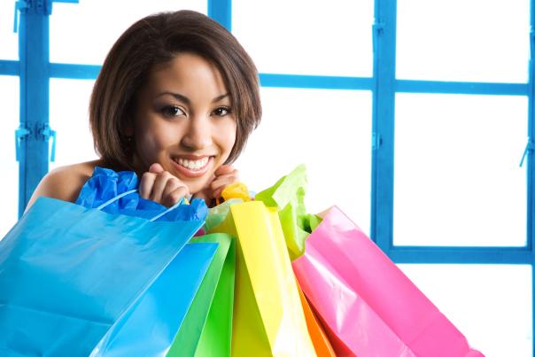 african american woman holding shopping bags