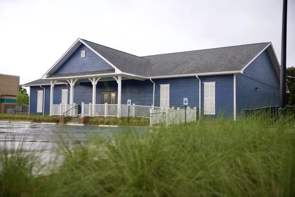 one story building among tall grass