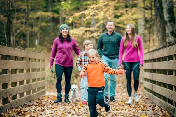 family on a trail in the fall