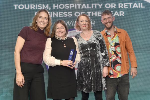 Danielle Dunfield presenting award to Ghost at the Feast | Chichester & District Business Awards 2025