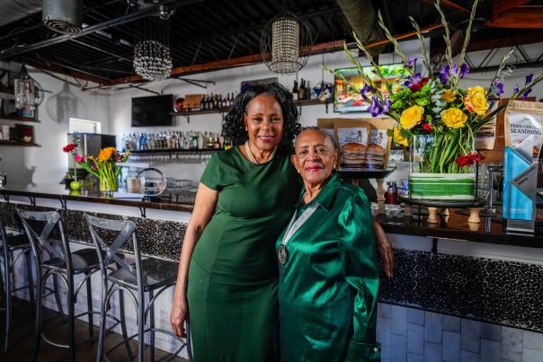 Florence Jones Kemp on the right, posing with her daughter, Victoria Kemp, at her restaurant, Florence's