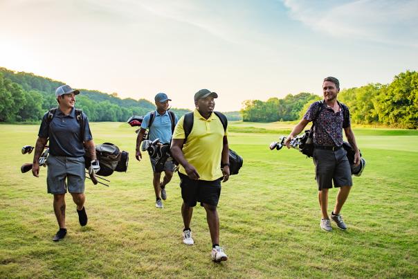 group of men on a golf course