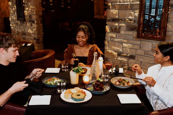 Friends dining at Copper Spoon