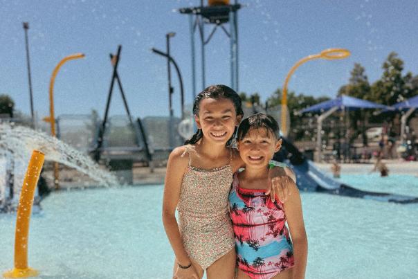 sisters posing in the new Island Park Pool.