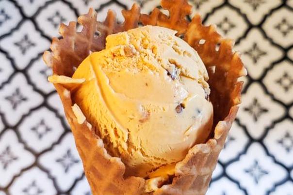 Pumpkin Praline ice cream in a waffle cone from West Central Microcreamery