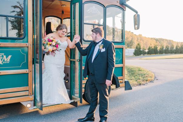 Wedding Couple getting off of Trolley