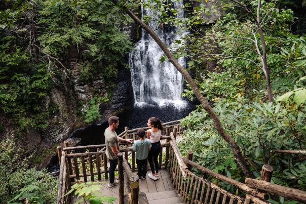 A family enjoys a visit to Bushkill Falls in the Pocono Mountains.