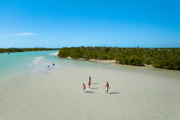 Family enjoying the shoreline at Stump Pass Beach State Park