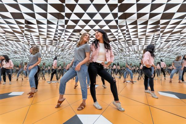 museum of illusions infinity room millenial girls