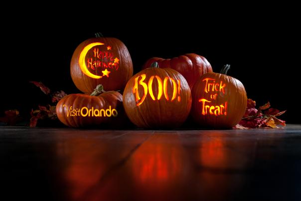 Pumpkins with Visit Orlando logo, Happy Halloween, Boo and Trick or Treat carved on them