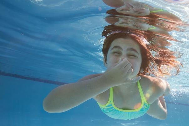 Swimming in hotel swimming pool