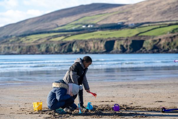 Kids playing on Inch Beach winter