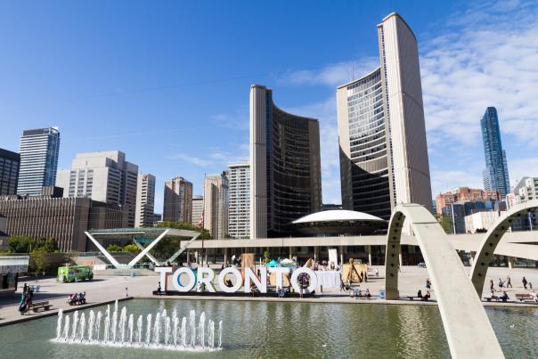 A view of City Hall and the Toronto Sign in summer