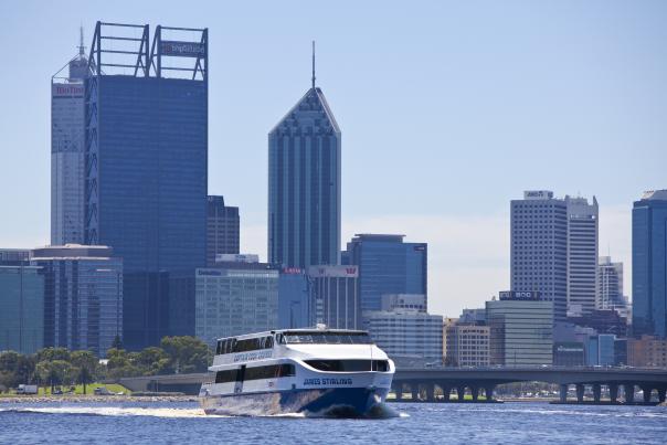 Captain Cook ferry cruising in front of the Perth city skyline.