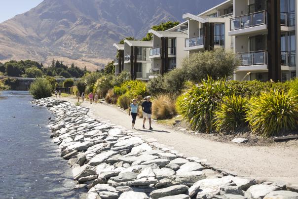 Couple walking past the Hilton