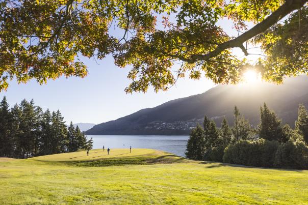 Golfers at Queenstown Golf course in spring