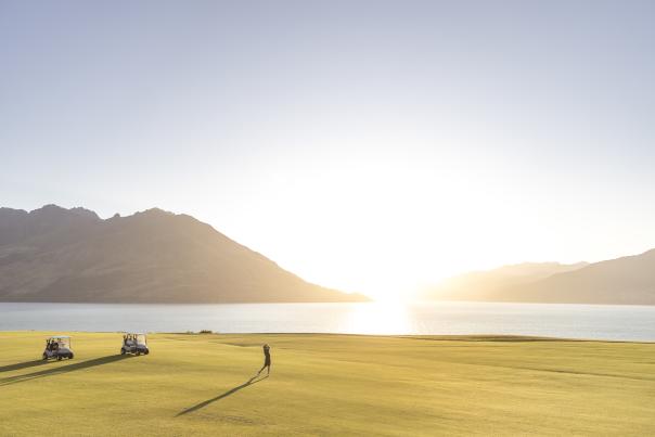 Golfer takes a swing at Jacks Point in summer