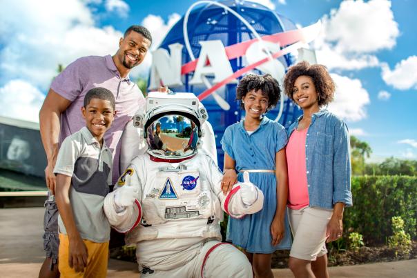 Kennedy Space Center family with astronaut in suit