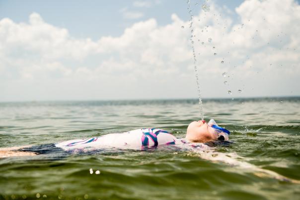 A little girl floats in the waters of St. Joseph Bay