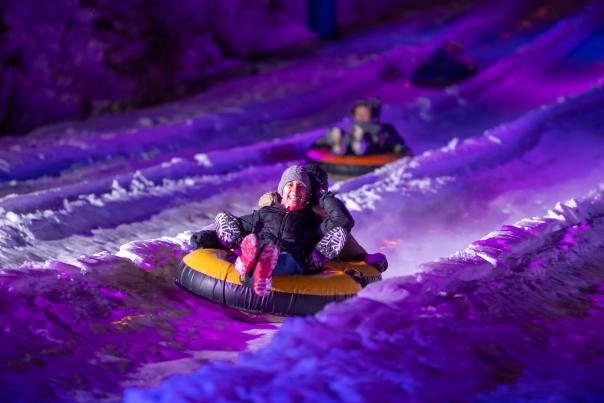 Guests enjoy snow tubing after dark at Blue Mountain in the Poconos.