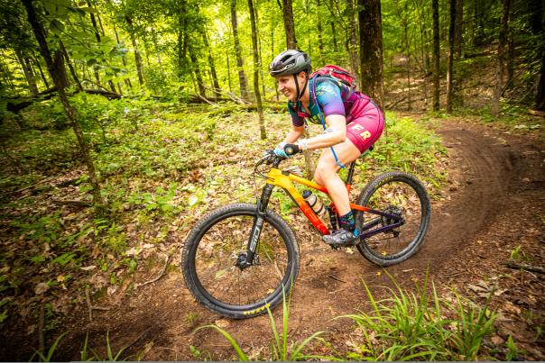 A mountain biker competes in the XTERRA North American Championship on the trails at Oak Mountain State Park.