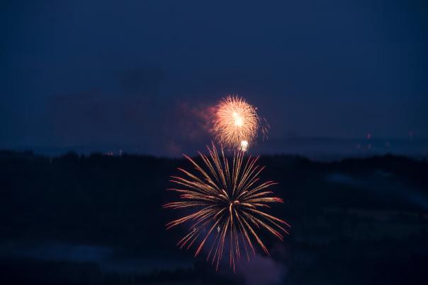 Fireworks light up the night sky over Dirt Farm Brewing in Bluemont, Virginia
