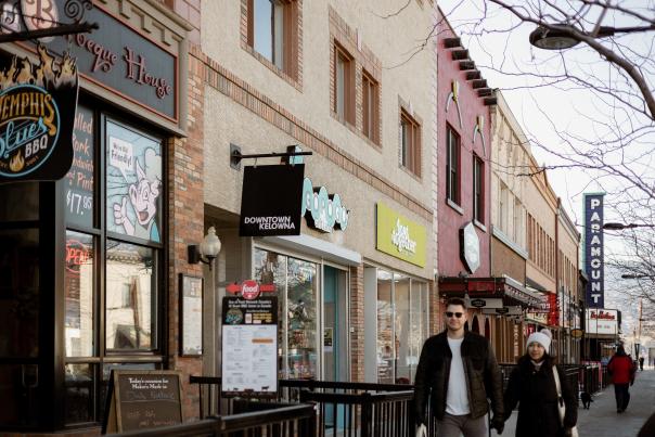 Couple Walking on Bernard Ave Downtown 7