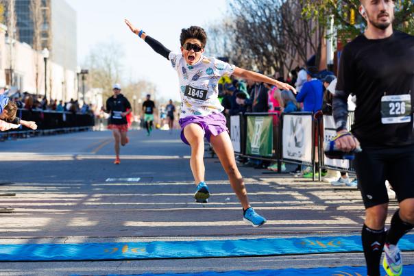 Crossing the Finish Line Bentonville Half Marathon