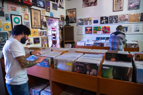 Two men looking at records at Alley Records