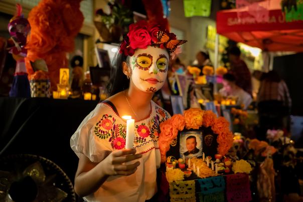 Altar decorated with marigolds and sugar skulls at Santa Ana Día de Los Muertos festival