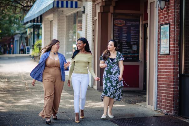 Three women enjoy a stroll in downtown Stroudsburg