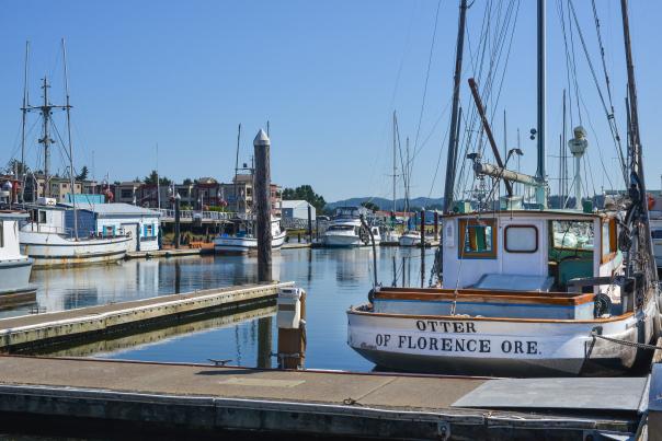 A boat called 'Otter' is docked at the Florence Marina.