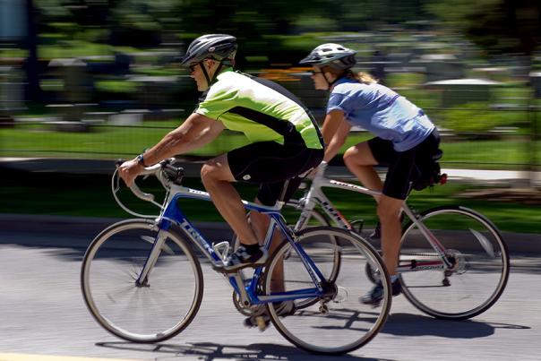 Two bicyclists riding road bikes in Johnston County, NC.