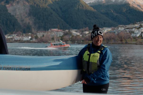 Frances - Waka Ama holding a canoe