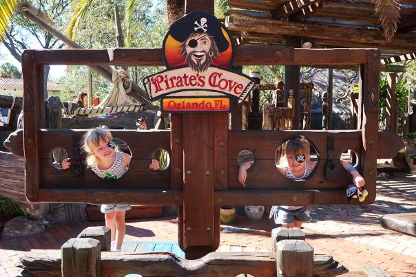 Influencer Katie Ellison and her family at Pirate's Cove miniature golf