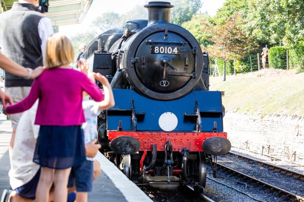 A heritage steam train at Swanage Railway Station