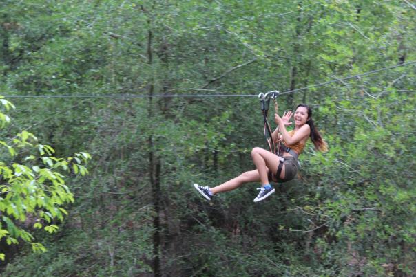 Orlando Tree Trek Adventure Park girl on zipline