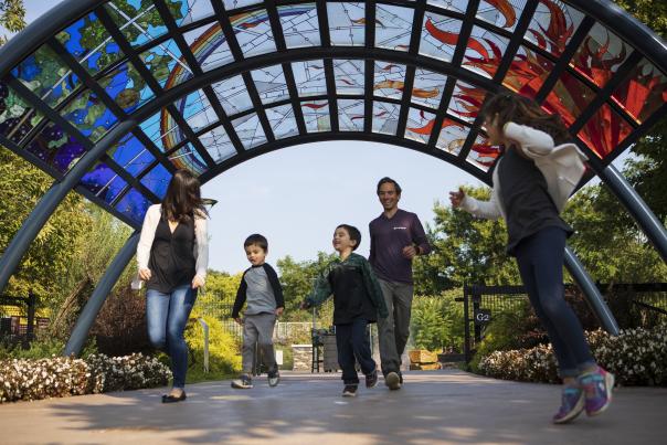 Family playing in the Children's Garden at Franklin Park Conservatory