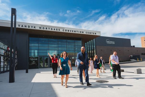 people exiting the conference center
