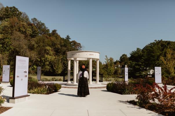 Women staring at the Turning Point Suffragist Memorial